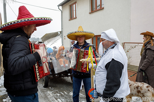 Image of People attend the Masopust Carnival