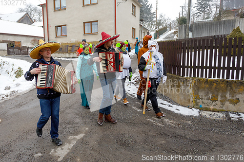 Image of People attend the Masopust Carnival