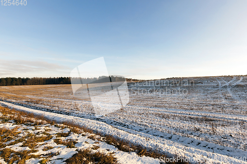 Image of snow-covered land in the field