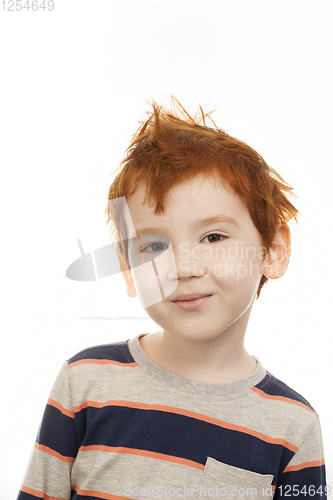 Image of smiling redhead boy