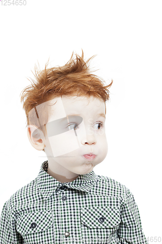 Image of dishevelled red head boy