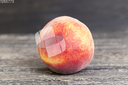 Image of one ripe peach