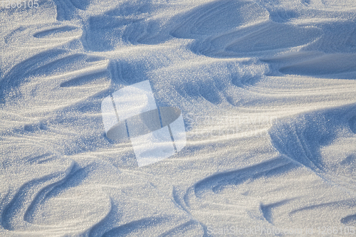 Image of Snowdrifts in a field in winter