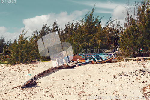 Image of abandoned boat in sandy beach in madagascar