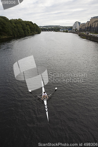 Image of Single man training  - sport rowing