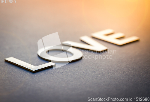 Image of Word love written with white solid letters