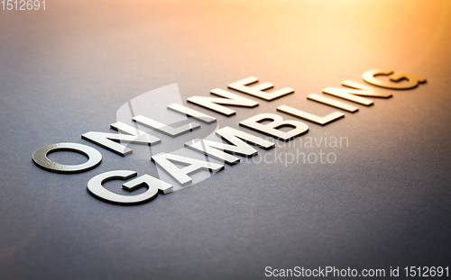 Image of Word online gambling written with white solid letters