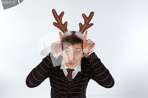 Image of Young man wearing deer horns