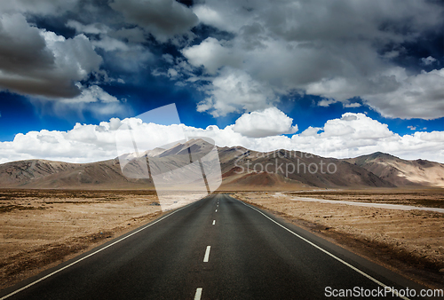 Image of Road on plains in Himalayas with mountains