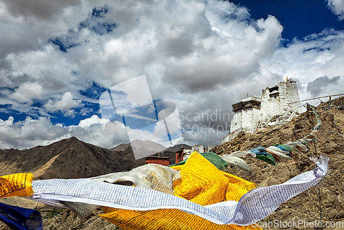 Image of Leh gompa and lungta prayer flags, Ladakh