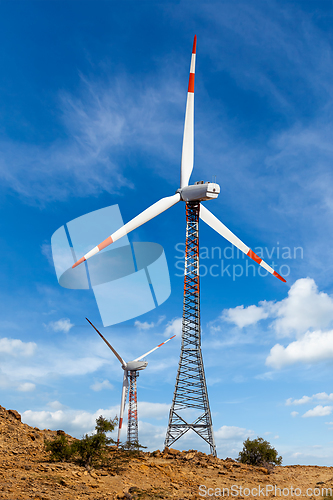 Image of Wind generator turbines sihouettes