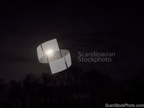 Image of Ring Around Moon and Clouds