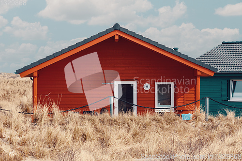 Image of colorful wooden tiny houses on the island