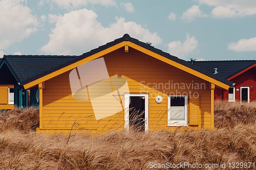 Image of colorful wooden tiny houses on the island