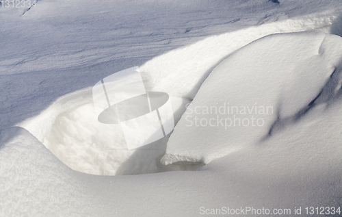 Image of broken snow drift from