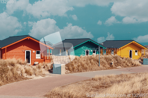 Image of colorful wooden tiny houses on the island