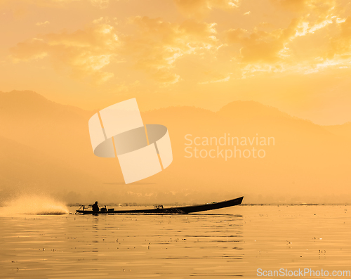 Image of Motor boat silhouette on Inle lake