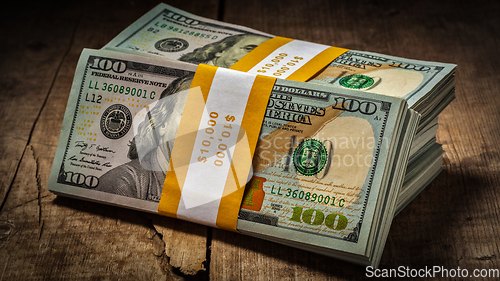 Image of Stacks of new 100 US dollars banknotes