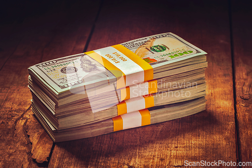 Image of Stacks of 100 US dollars 2013 edition banknotes