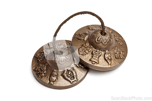 Image of Tibetan Buddhist tingsha cymbals isolated