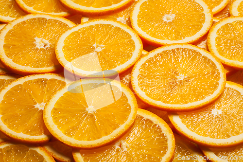 Image of Colorful orange fruit slices