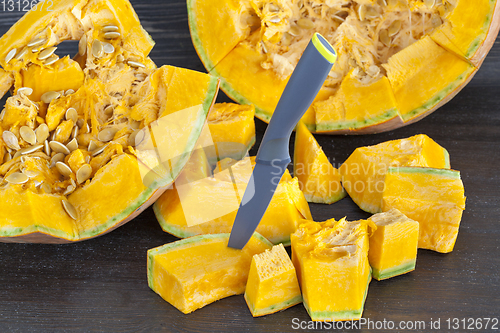 Image of A large pumpkin sliced