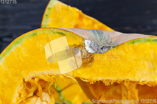 Image of Cut in half rotten pumpkin