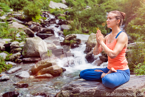 Image of Woman in Padmasana outdoors