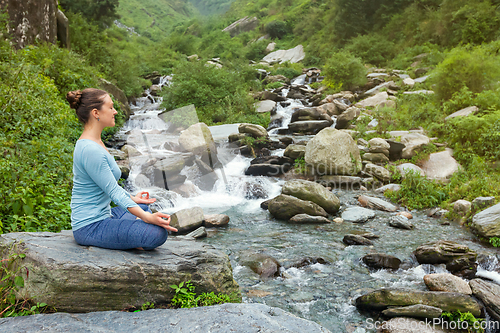 Image of Woman in Padmasana outdoors