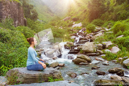 Image of Woman in Padmasana outdoors