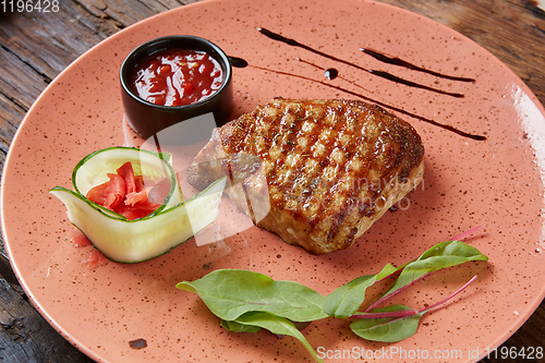 Image of The beef steak on plate. Shallow dof.