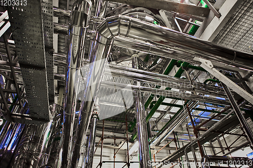 Image of Equipment and piping as found inside of industrial thermal power plant.