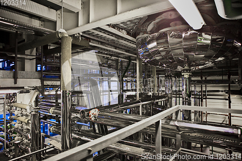 Image of Equipment and piping as found inside of industrial thermal power plant.