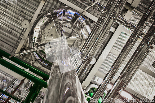 Image of Equipment and piping as found inside of industrial thermal power plant.