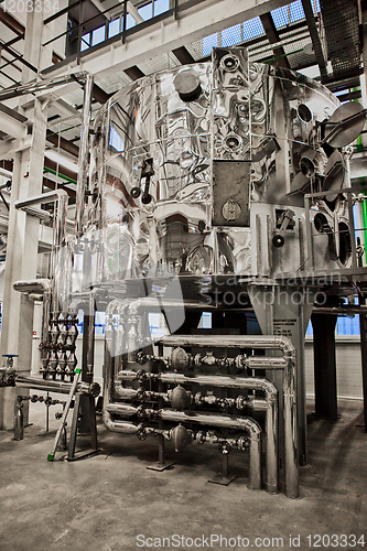 Image of Equipment and piping as found inside of industrial thermal power plant.