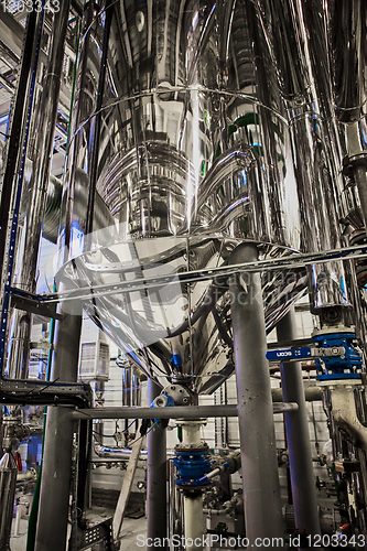 Image of Equipment and piping as found inside of industrial thermal power plant.