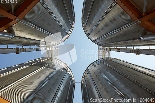 Image of Modern silos for storing grain harvest. Agriculture. Background.