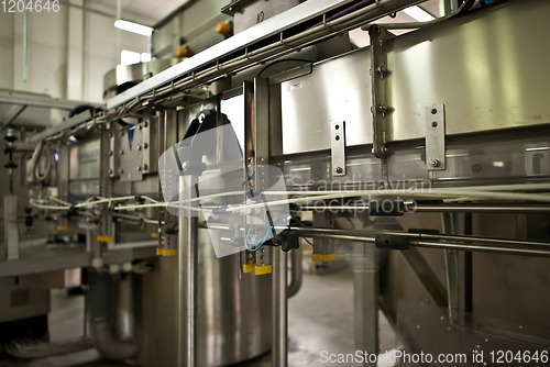 Image of Production of the bottles plastic The Technological line on production of the plastic bottles.
