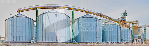 Image of Modern silos for storing grain harvest. Agriculture. Background.