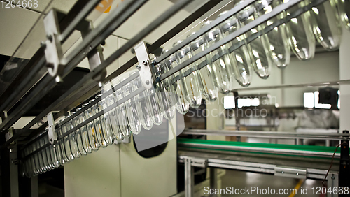 Image of Production of the bottles plastic The Technological line on production of the plastic bottles.