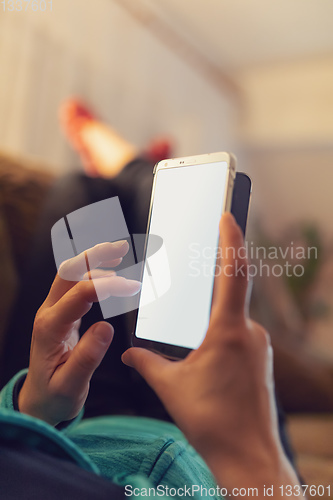 Image of woman hand holding mobile phone