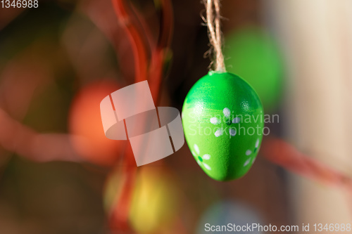 Image of Easter eggs on tree with bokeh