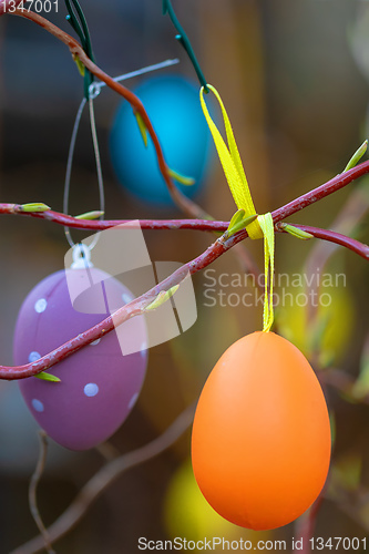 Image of Easter eggs on tree with bokeh