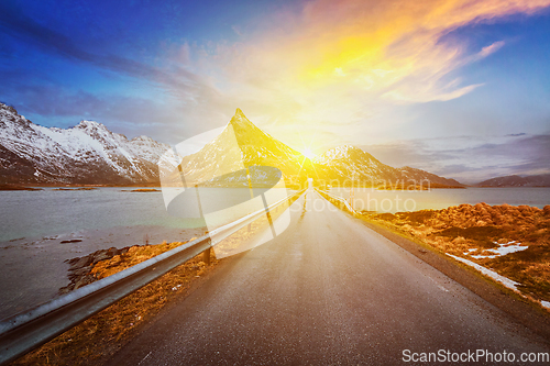 Image of Road in Norway in fjord on sunset