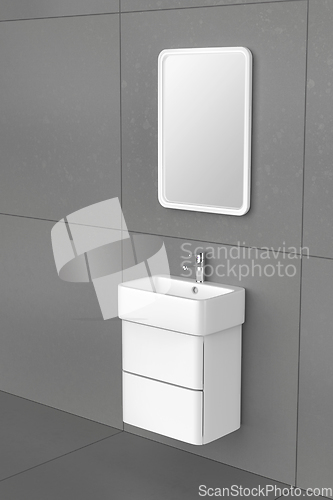 Image of Wash basin cabinet with silver faucet and mirror
