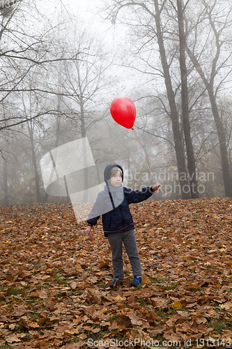 Image of boy and balloon
