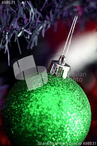 Image of Christmas ornaments on tree.