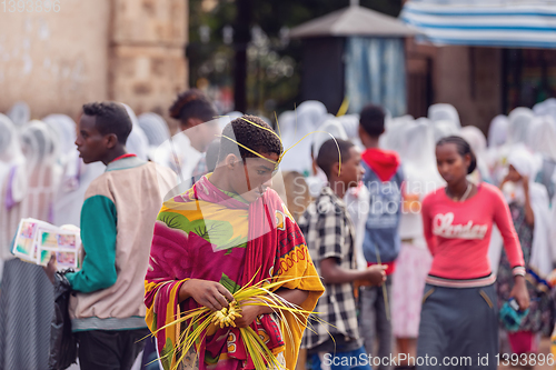 Image of Orthodox Christian pilgrim at worship on the street during easter