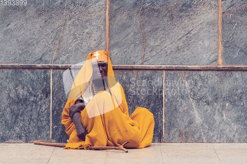 Image of Monk rest in shadow of Church of Our Lady of Zion in Axum