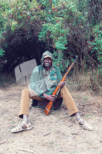 Image of park scout with rifle in Simien Mountain, Ethiopia